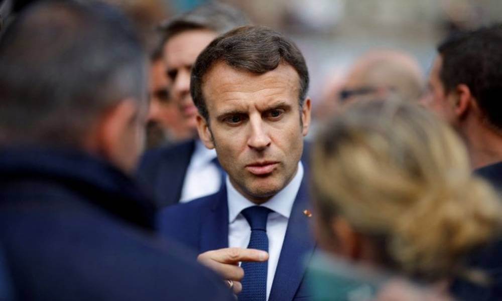 Macron faces a tough fight as France votes on Sunday.